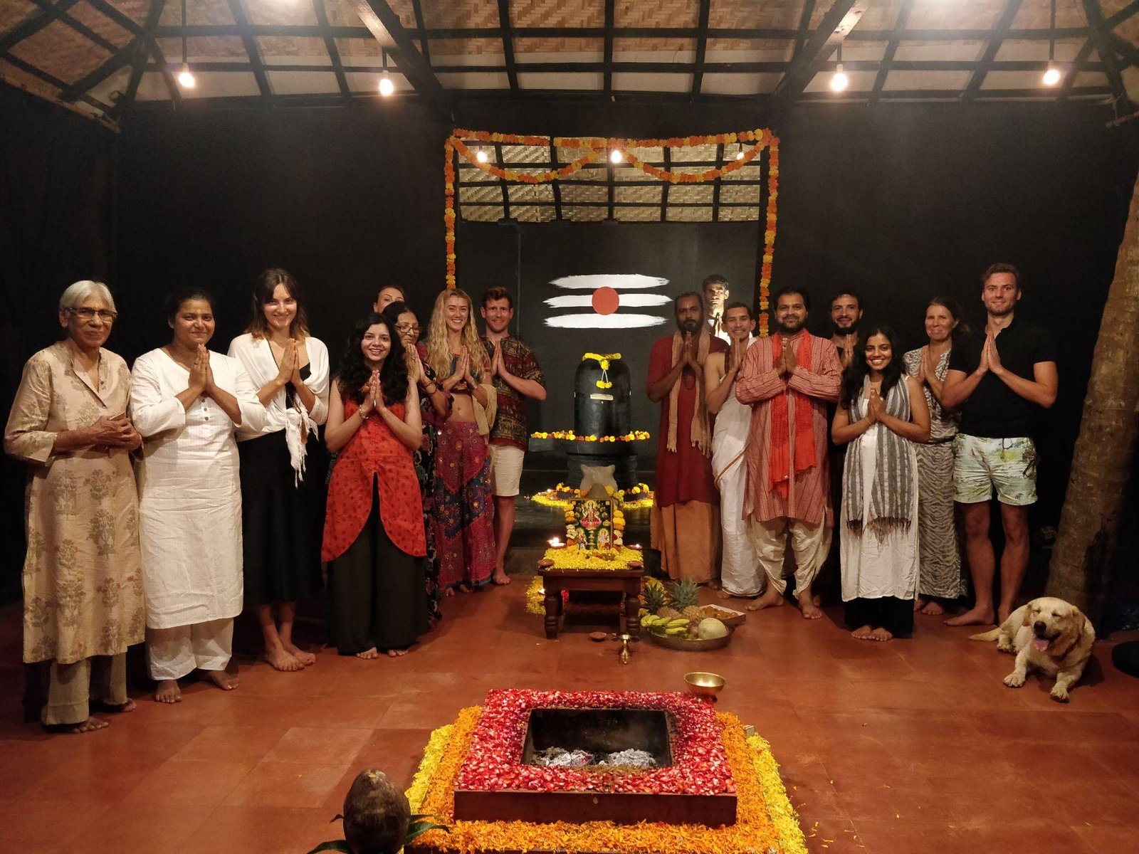 Guests and staff gathered in the SWAN Yoga Retreat temple